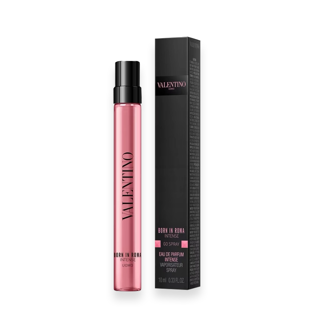 Valentino Uomo Born in Roma Intense Pocket Spray Eau de Parfum Intense » Scott Beauty Shop Pink Valentino Born in Roma Intense perfume bottle with black cap beside its black box.