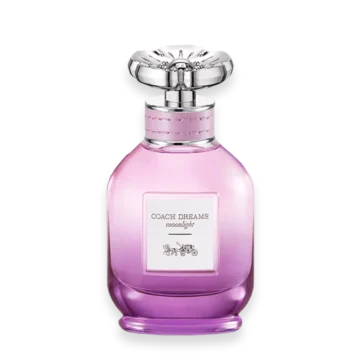 Pink gradient perfume bottle with a large ornate silver cap and a pink strap around the neck; label reads 'Coach Dreams moonlight'.