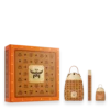 Orange MCM gift box with gold crest and monogram pattern, accompanied by a coordinating monogram handbag, perfume bottle, and travel spray.