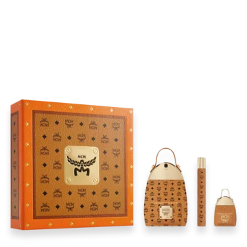 MCM Gift Set Eau de Parfum » Scott Beauty Shop Orange MCM gift box with gold crest and monogram pattern, accompanied by a coordinating monogram handbag, perfume bottle, and travel spray.