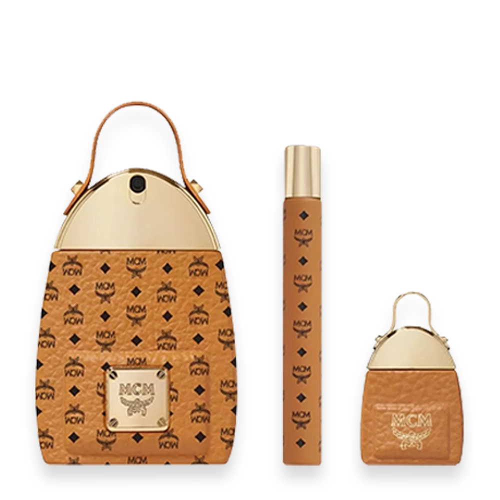MCM Gift Set Eau de Parfum » Scott Beauty Shop MCM perfume gift set: tan monogrammed travel tote, tall fragrance bottle, and matching mini pouch.