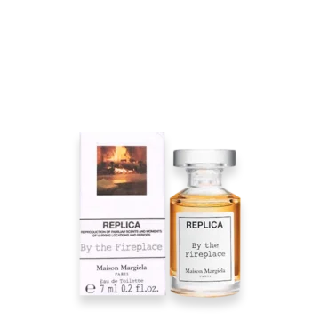Replica By The Fireplace Eau de Toilette bottle with minimalist label and warm amber liquid
