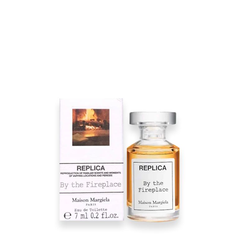 Replica By The Fireplace Eau de Toilette – Warm Smoky Vanilla Fragrance » Scott Beauty Shop Replica By The Fireplace Eau de Toilette bottle with minimalist label and warm amber liquid