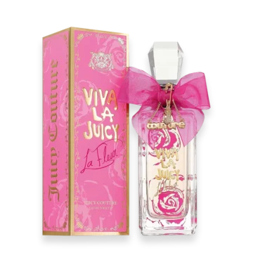 Juicy Couture Viva La Juicy La Fleur perfume bottle with pink box and pink bow, gold lettering, transparent glass showing pink liquid