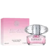 Bottle of Versace Bright Crystal perfume featuring a clear pink design with a faceted crystal-like cap