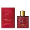 Bottle of Versace Eros Flame featuring deep red glass with gold Medusa emblem