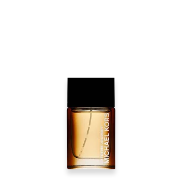 Michael Kors Extreme Journey perfume bottle with amber liquid and a black cap on a dark background