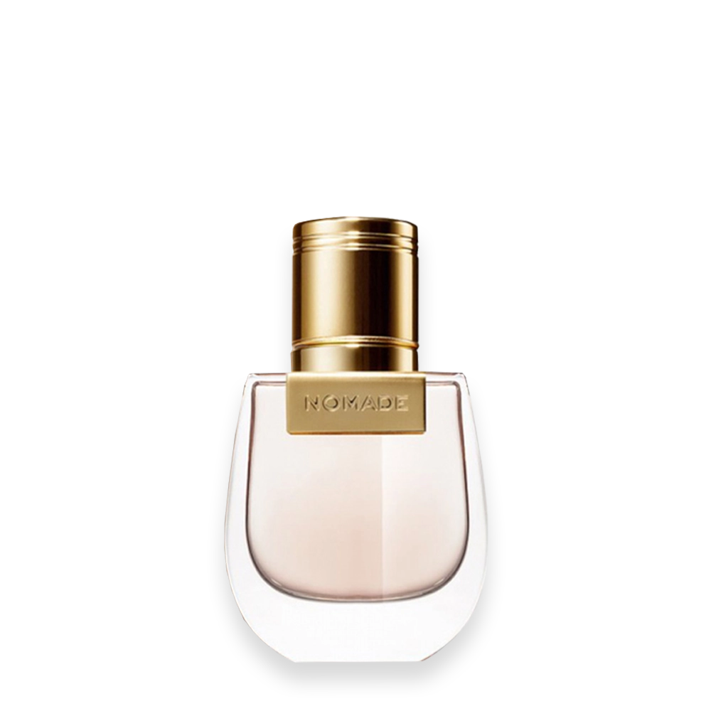 Chloé Nomade Eau de Parfum » Scott Beauty Shop Nomade perfume bottle with a gold cap and light pink liquid in a curved glass flask