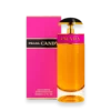Bottle of Prada Candy perfume featuring a vibrant pink and gold design with a modern luxury aesthetic