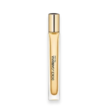 Dolce & Gabbana perfume bottle with a gold cap and amber liquid.