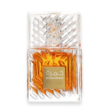 Crystal perfume bottle with a textured, faceted cap and amber liquid; label reads KHAMRAH in Arabic and English.