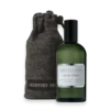 Grey Flannel by Geoffrey Beene cologne bottle with grey fabric pouch