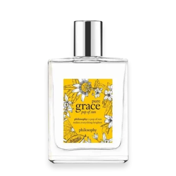Clear glass perfume bottle with a silver cap and a bright yellow label featuring florals and the word 'grace' (Fragrance by Philosophy).
