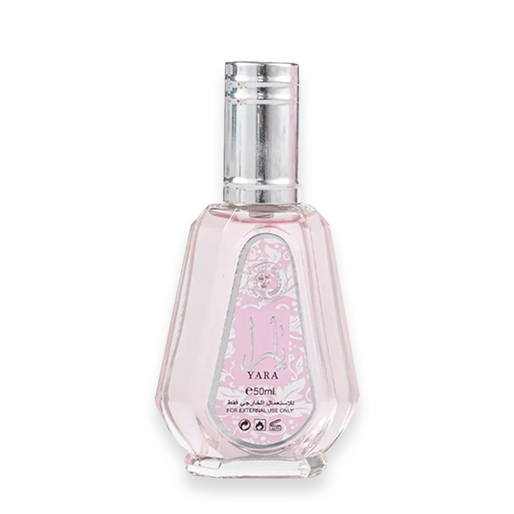 Yara by Lattafa Perfumes Eau de Parfum » Scott Beauty Shop Pink glass perfume bottle with a silver cap, labeled 'YARA' 50 ml, for external use only.