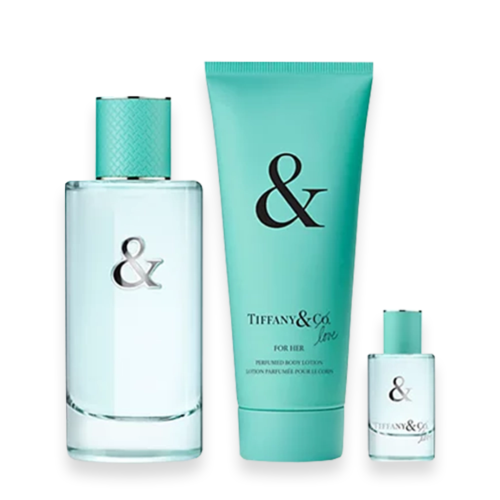 Tiffany & Love For Her Gift Set Eau de Parfum » Scott Beauty Shop Gift set of Tiffany & Co fragrances: three turquoise-accented bottles (tall clear bottle with teal cap, large teal tube labeled & for her, small clear bottle).