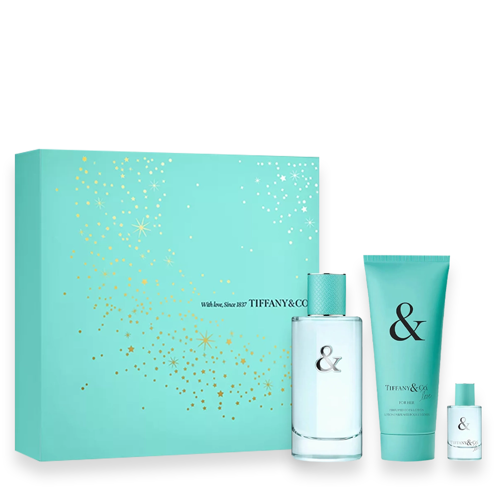 Tiffany & Love For Her Gift Set Eau de Parfum » Scott Beauty Shop Turquoise Tiffany & Co. gift set with a perfume bottle, lotion tube, and a small fragrance bottle beside a turquoise box with gold confetti pattern.